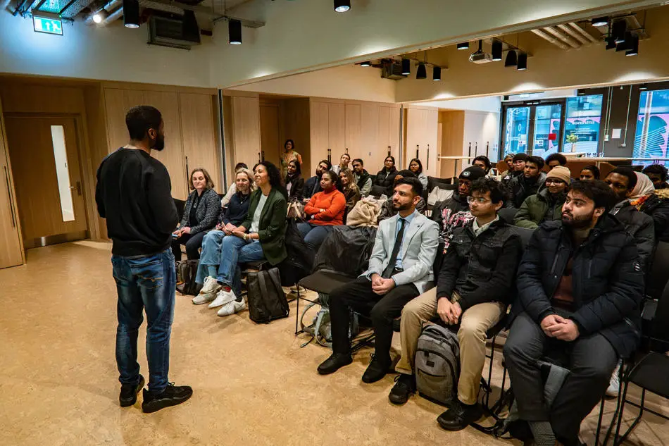 Impact Hub speaker Louis Howell presenting to Brunel students 